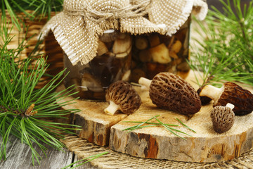 Canned mushrooms in a glass jar