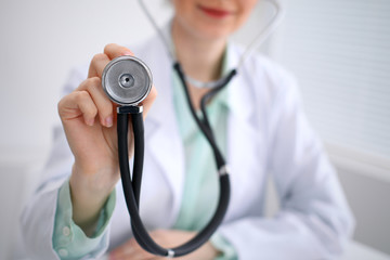 Doctor with a stethoscope in the hands