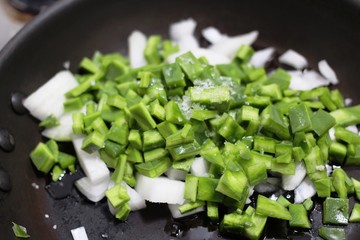Mexican cactus with onion in a pan