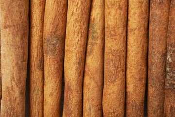Surface covered with cinnamon sticks