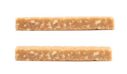 Toffee candy with nuts isolated