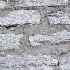 Fragment of an old brick wall