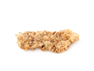 Single wholegrain cereal flake isolated