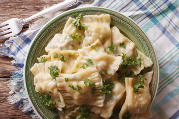 German ravioli Maultaschen with spinach and meat close up. Horizontal top view
