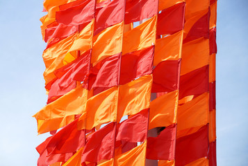 Festive flags of red and orange color