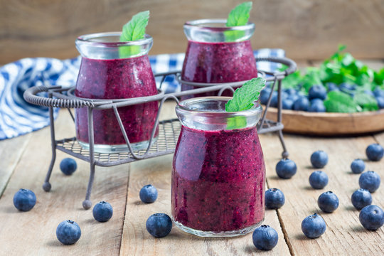 Fresh smoothie with blueberry, plum, mint and basil