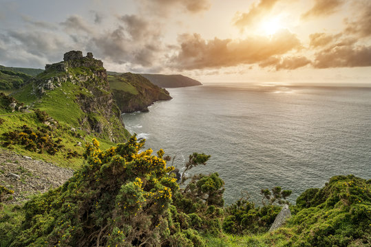 Beautiful evening sunset landscape image of Valley of The Rocks
