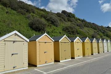 Fototapeta na wymiar Beach huts on seafront at Bournemouth, Dorset