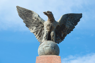 The sculpture of an eagle close up. The top of the monument to the soldiers of the regiment...