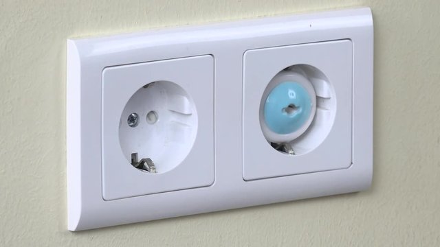 Hand remove safety plug from electricity outlet and insert plug wire