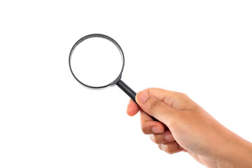 Hand holding a magnifieragainst white background