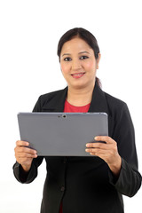 Young business woman using tablet computer