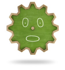 Green cogwheel shape blackboard isolated on white