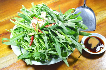 morning glory and sauce with iron flipper prepare to cook