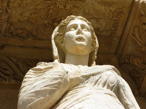 Ephesus, Turkey Library of Celsus detail of female statue with broken nose rolling eyes skyward