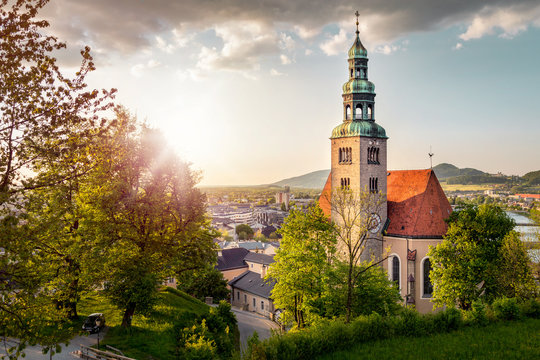 View over Stadt Salzburg with Muelln monastery in the evening in
