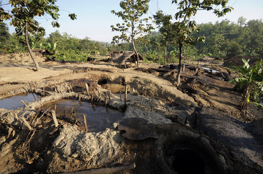 JAVA, INDONESIA - November 30, 2008: Environmental pollution and destruction caused by an illegal oil field on November 30, 2008 in Kadewan, East Java, Indonesia.