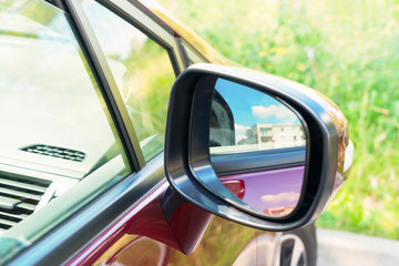 side rear-view mirror on car