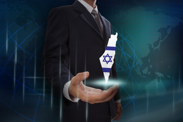 Businessman showing map of Israel on globe background