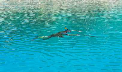 underwater hunter with a gun in a mask. speargun