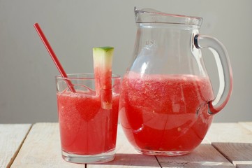 Healthy fresh smoothie drink from red watermelon and ice drift