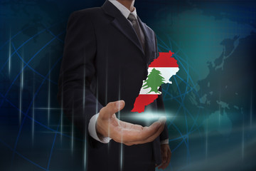 Businessman showing map of Lebanon on globe background