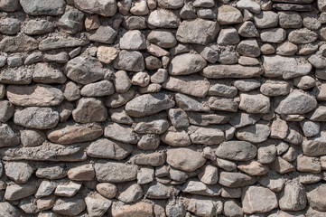 Wall built of natural stone