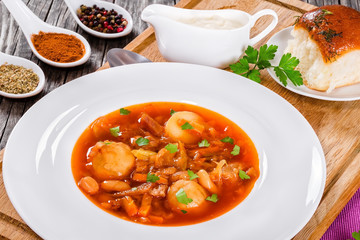  Ukrainian vegetable and meat soup borscht , close-up