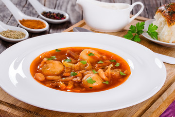 Ukrainian vegetable and meat soup borscht , close-up