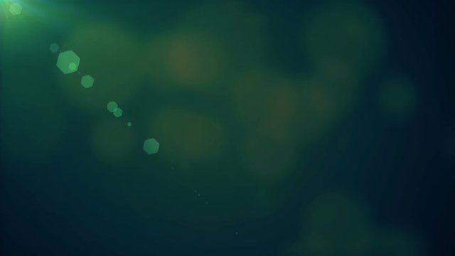 Blured bokeh on dark a green background