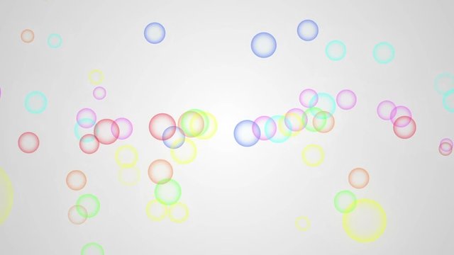 Animation of moving colorful bubbles on a white background