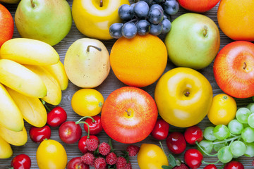 Mixed fruits on wooden board, concept of healthy eating and diet
