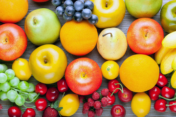 Mixed fruits on wooden board, concept of healthy eating and diet
