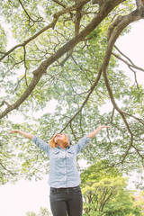 Fototapeta premium Young beautiful asian women stretch enjoying with fresh air in t