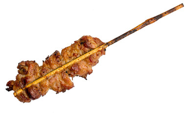 Teriyaki chicken kebabs on wooden skewers.