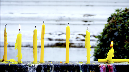 Candle light in the temple daytime