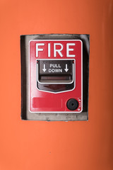 Fire Alarm in Orange Wall