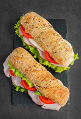 Sandwich with ham and tomatos