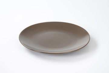 Empty brown plate