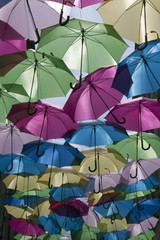 colourful Umbrellas in a street in Paris, France