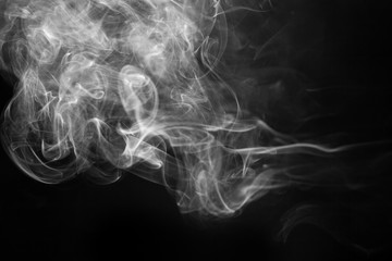 White smoke on a black background.