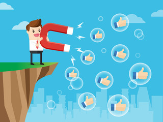 businessman standing on top cliff rock and using huge magnet attract positive feedback