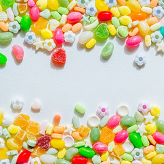 Fototapeta na wymiar Frame of colorful sweets