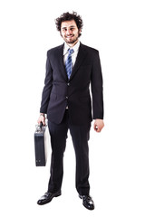 smiling businessman with black suitcase