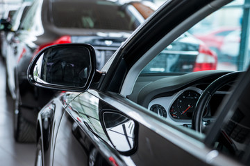 Fototapeta premium New cars at dealer showroom