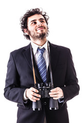 pensive businessman with binoculars