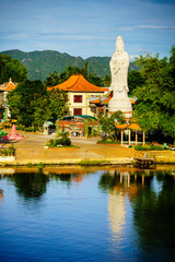 Buddhist goddess of mercy. Statue in chinese temple Thailand