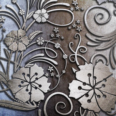 Fototapeta na wymiar floral metal plate background
