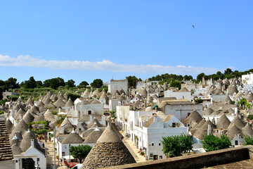 Fototapeta na wymiar The town of Alberobello, Apulia, Italy; Unesco Point with picturesque village.