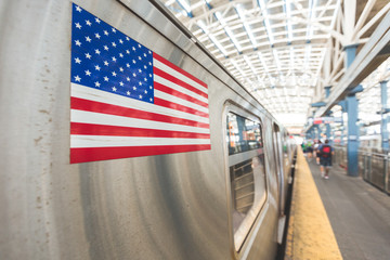 Naklejka premium United States flag on a subway train